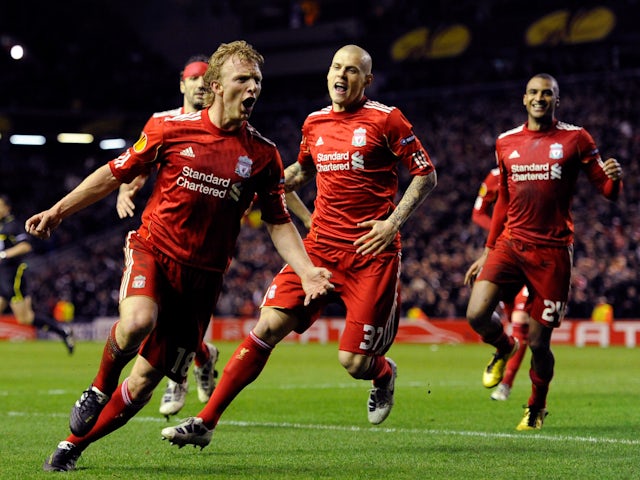Liverpool's Dirk Kuyt (L) celebrates his goal against Sparta Prague during their Europa League match on February 24, 2011