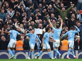 Manchester City's John Stones celebrates scoring their first goal on March 10, 2024