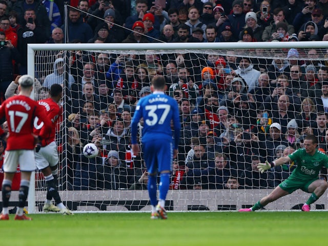 Manchester United's Marcus Rashford scores their second goal past Everton's Jordan Pickford from the penalty spot on March 9, 2024
