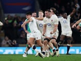 England's Marcus Smith celebrates with teammates after scoring a drop goal on March 9, 2024