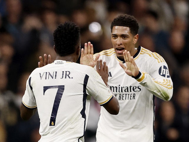 Real Madrid's Vinicius Junior celebrates scoring against RB Leipzig on March 6, 2024