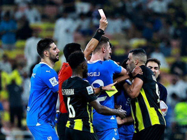Al Ittihad's Abderrazak Hamdallah reacts after being shown a red card on March 12, 2024