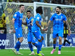Al Hilal's Yasser Al-Shahrani celebrates scoring their first goal with teammates on March 12, 2024