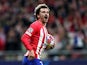 Atletico Madrid's Antoine Griezmann celebrates scoring their first goal on March 13, 2024