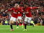 Manchester United's Antony celebrates scoring their second goal with Amad Diallo on March 17, 2024