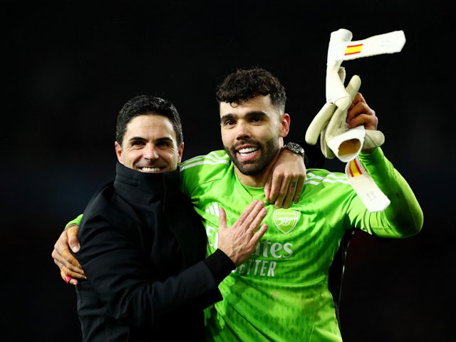 Arsenal manager Mikel Arteta and David Raya celebrate after the match on March 13, 2024