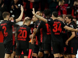 Bayer Leverkusen's Florian Wirtz celebrates scoring their second goal with teammates on March 10, 2024