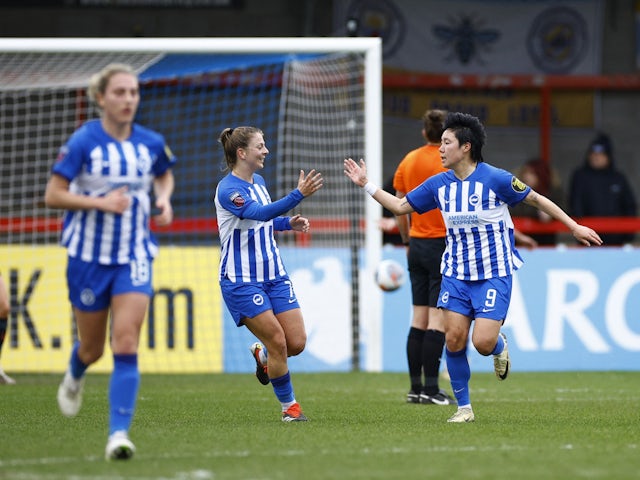 Brighton & Hove Albion Women's Lee Geum-Min celebrates scoring their first goal with Veatriki Sarri on March 17, 2024