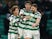 Celtic's Kyogo Furuhashi celebrates scoring their fourth goal with James Forrest and Paulo Bernardo on March 10, 2024