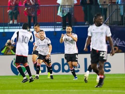 FC Dallas midfielder Sebastian Lletget (8) celebrates with teammates after scoring a goal on March 17, 2024