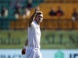 England's James Anderson acknowledges the crowd after taking his 700th Test wicket following the dismissal of India's Kuldeep Yadav, caught out by Ben Foakes on March 7, 2024