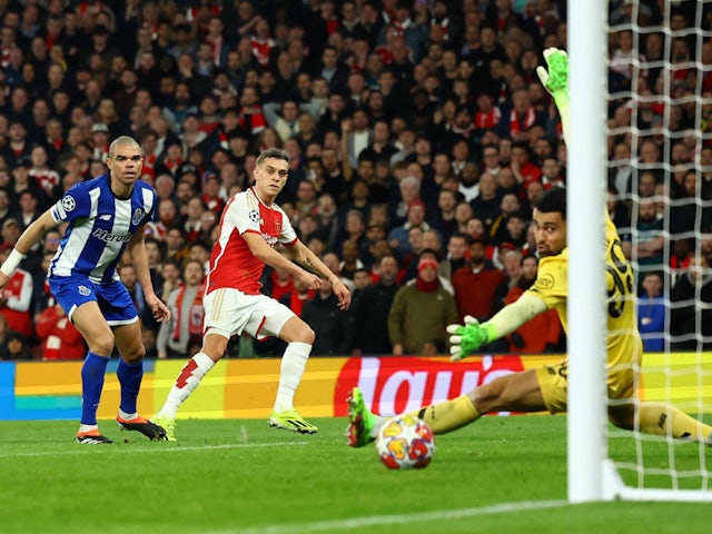 Arsenal's Leandro Trossard scores their first goal on March 12, 2024