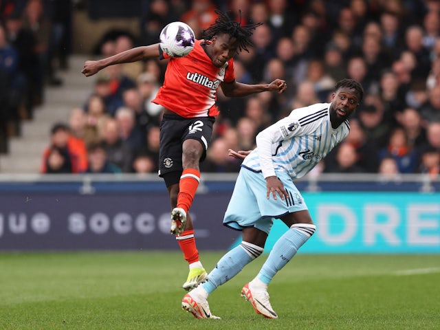 Luton Town's Issa Kabore in action with Nottingham Forest's Divock Origi on March 16, 2024