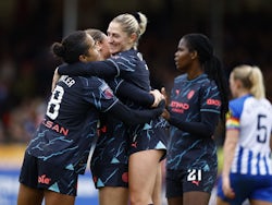 Manchester City Women's Laura Coombs celebrates scoring their fourth goal with teammates on March 17, 2024