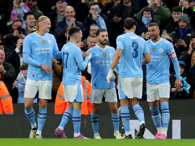 Manchester City's Bernardo Silva celebrates scoring their first goal with teammates on March 16, 2024