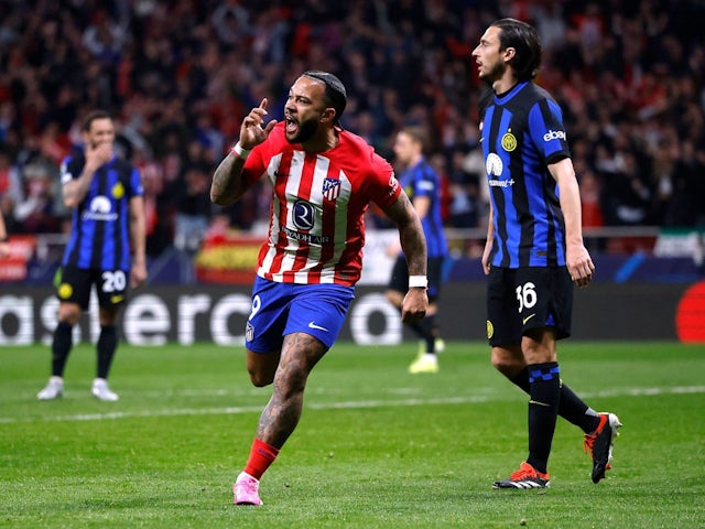 Atletico Madrid's Memphis Depay celebrates scoring their second goal on March 13, 2024