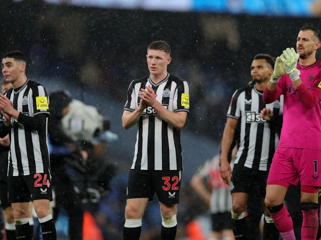 Newcastle United's Miguel Almiron, Elliot Anderson and Martin Dubravka applaud their fans after the match on March 16, 2024