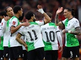 Liverpool's Mohamed Salah celebrates scoring their second goal with teammates on March 17, 2024