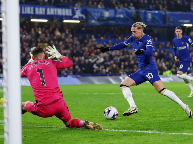Chelsea's Mykhaylo Mudryk scores their third goal past Newcastle United's Martin Dubravka on March 11, 2024