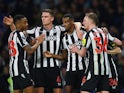 Newcastle United's Alexander Isak celebrates scoring their first goal with teammates on March 11, 2024