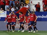 Osasuna's Ante Budimir celebrates scoring their first goal with teammates on March 16, 2024