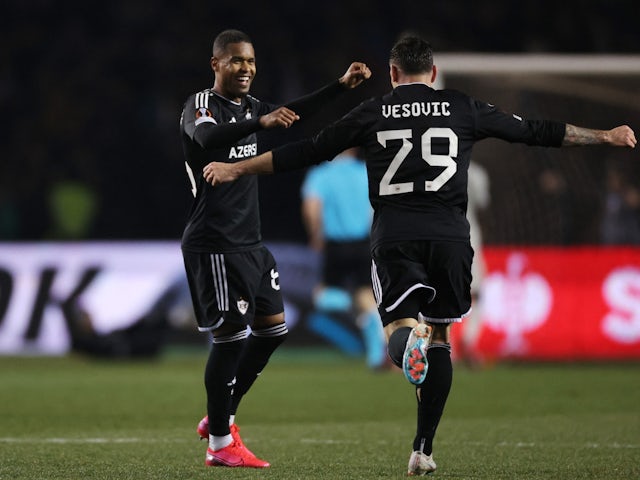 Qarabag's Patrick Andrade and Marko Vesovic celebrate their second goal on March 7, 2024