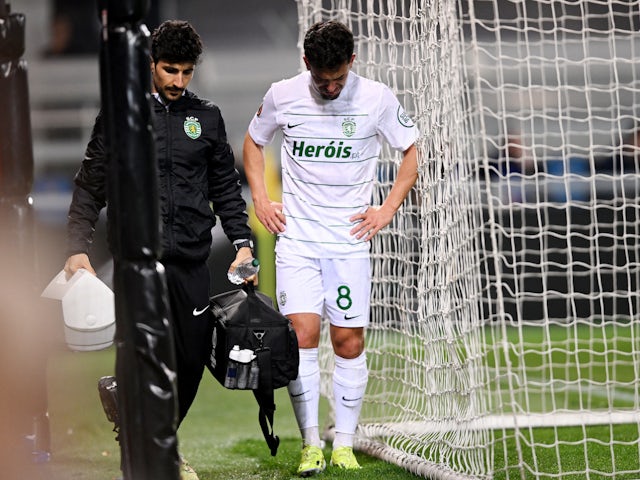 Sporting Lisbon's Pedro Goncalves receives medical attention after scoring their first goal on March 14, 2024