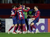 Barcelona's Robert Lewandowski celebrates scoring their third goal with teammates on March 12, 2024