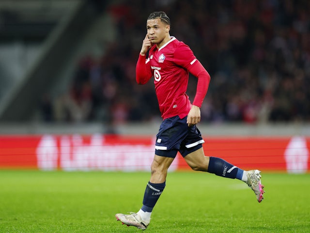 Lille's Tiago Santos celebrates scoring their first goal on March 14, 2024