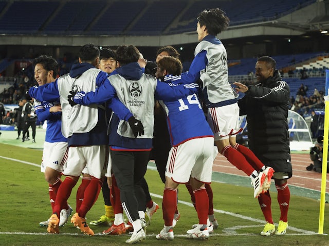 Yokohama F Marinos players celebrate their first goal, scored by Anderson Lopes on March 13, 2024
