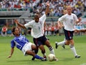 England's Ashley Cole and Brazil's Ronaldinho at the 2002 World Cup