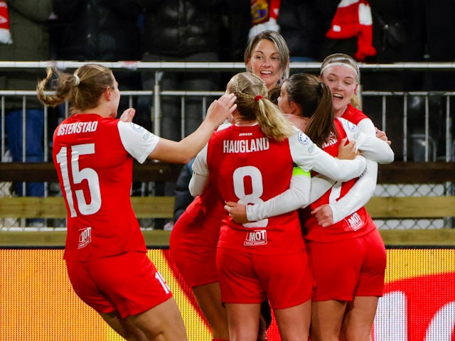 Brann's Cecilie Redisch Kvamme celebrates scoring their first goal with teammates on March 20, 2024