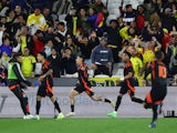 Colombia's Daniel Munoz celebrates scoring their first goal with Luis Diaz and Johan Mojica on March 22, 2024