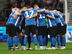 Estonia players huddle before the match on March 21, 2024
