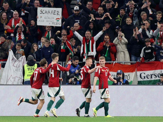 Hungary's Andras Schafer celebrates scoring a goal with Laszlo Kleinheisler, Bendeguz Bolla and Callum Styles that was later disallowed on March 22, 2024