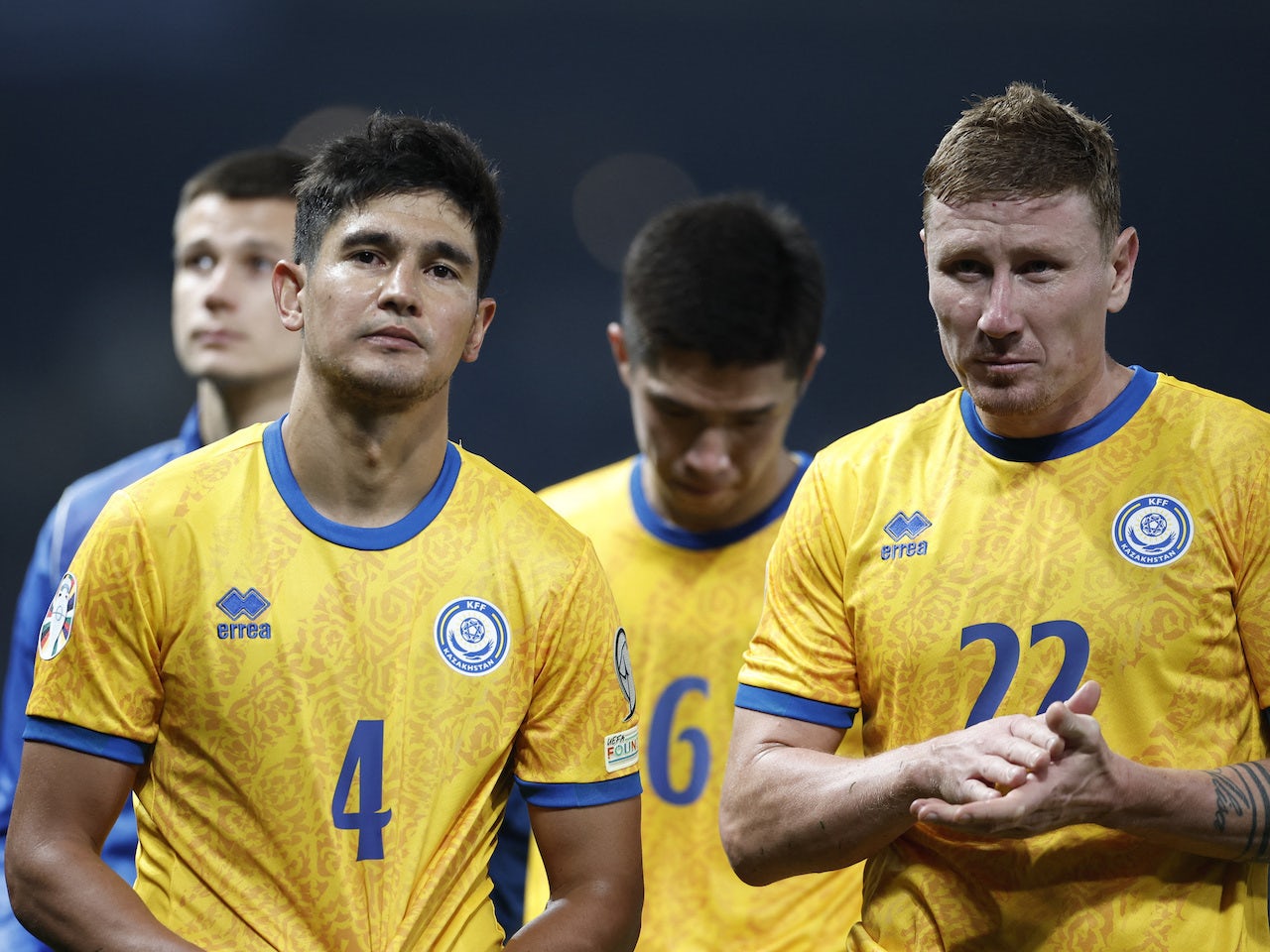 Kazakhstan's Marat Bystrov and Aleksandr Marochkin look dejected after ...