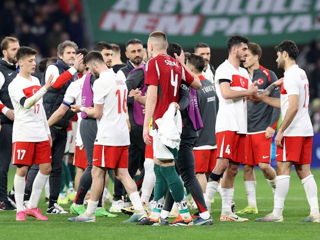 Turkey's Ismail Yuksek, Arda Guler, Samet Akaydin and Ozan Kabak look dejected after the match on March 22, 2024