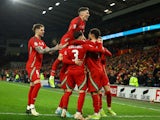 Wales' Brennan Johnson celebrates scoring their third goal with teammates on March 21, 2024