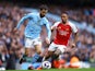 Manchester City's Bernardo Silva in action with Arsenal's Gabriel Jesus on March 31, 2024