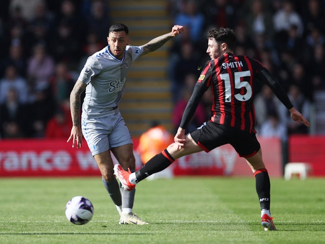 Everton's Dwight McNeil in action with Bournemouth's Adam Smith on March 30, 2024