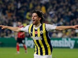 Fenerbahce's Ferdi Kadioglu celebrates scoring their first goal on December 14, 2023