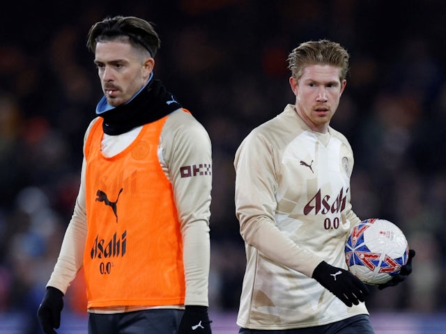 Manchester City's Jack Grealish and Kevin De Bruyne during the warm up before the match on February 27, 2024