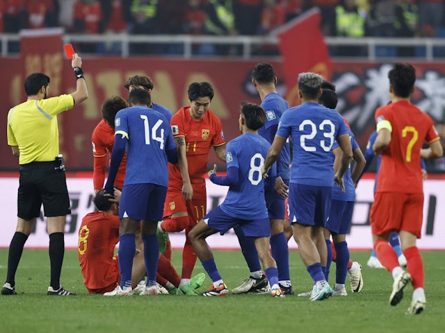 Referee Omar al-Ali shows a red card to China's Li Yuanyi on March 26, 2024