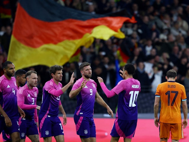 Germany's Niclas Fullkrug celebrates scoring their second goal with teammates on March 26, 2024