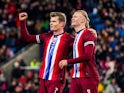 Norway's Alexander Sorloth celebrates scoring their first goal with Erling Haaland on March 26, 2024