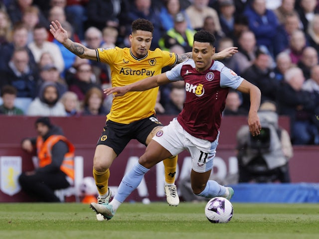 Aston Villa's Ollie Watkins and Wolverhampton Wanderers' Joao Gomes on March 30, 2024.
