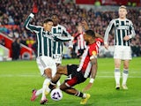 Manchester United's Raphael Varane in action with Brentford's Ivan Toney on March 30, 2024