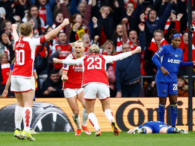 Arsenal's Stina Blackstenius celebrates scoring their first goal with Alessia Russo on March 31, 2024