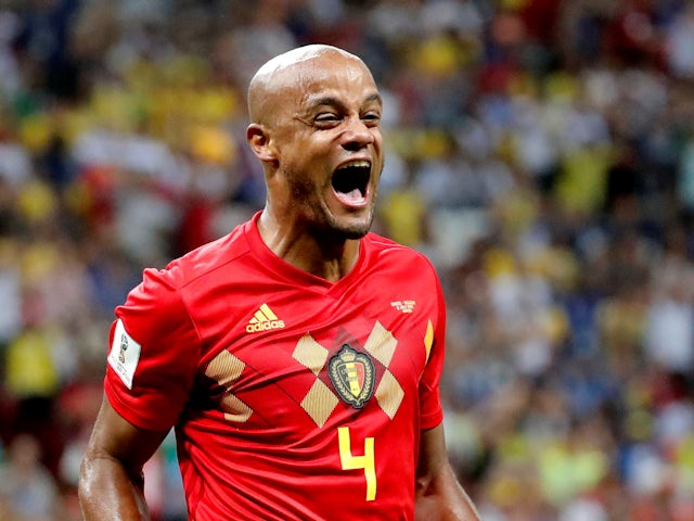 Belgium's Vincent Kompany celebrates their first goal on July 6, 2018