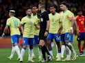 Brazil's Yan Couto, Galeno, Wendell and Lucas Paqueta react after referee Antonio Nobre awarded Spain a penalty on March 26, 2024